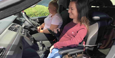 woman travelling in wheelchair as a passenger